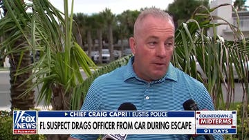 Suspect drags police officer from car in shocking bodycam footage