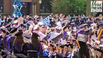 Yale graduates stage mass walkout at commencement