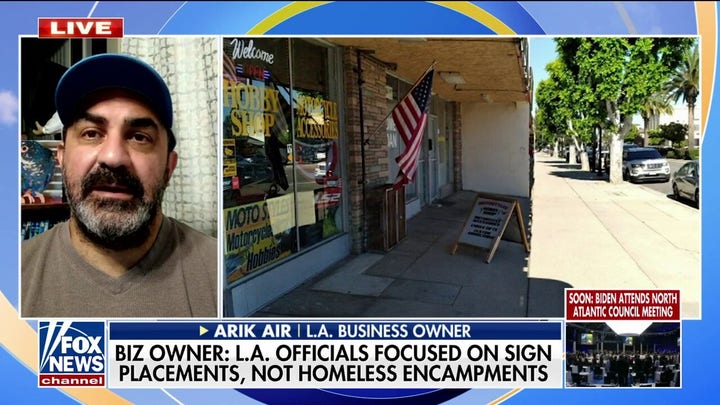 LA city officials crack down on business owner's sign, American flag placement, ignore nearby homeless camps