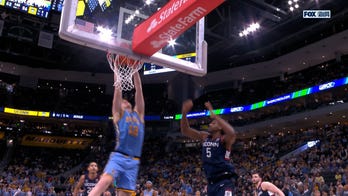 Marquette's Ben Gold hammers putback dunk, sealing UPSET win over No. 4 UConn