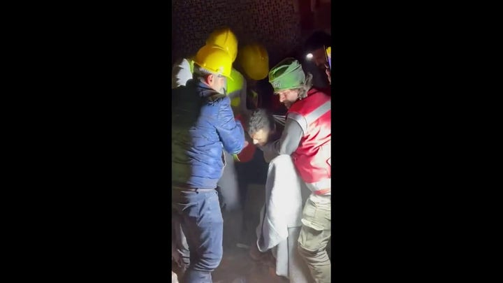 Turkey earthquake survivor is pulled out from underneath rubble