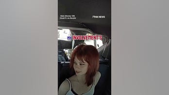 Teens accused of school murder plot seen LAUGHING in police car after arrest