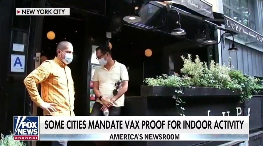 US business owners say vaccine proof may put economic recovery in jeopardy