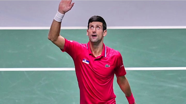 Novak Djokovic held in immigration hotel in Australia over vax status