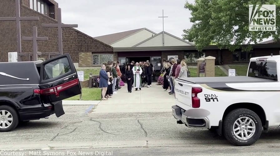 Pallbearers carry the coffin of 18-year-old Cayler Ellingson after his funeral in Carrington, North Dakota.