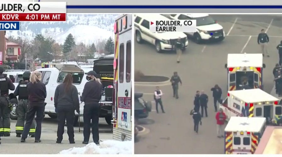 Man led away in handcuffs from active shooting scene at Colorado store