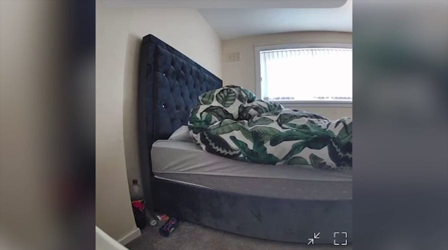 Woman horrified after watching security footage of stranger in her bed