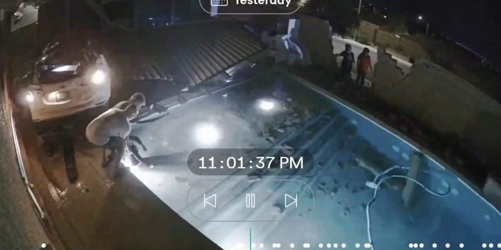 Video shows car crashing through wall and flipping over backyard pool as driver lands in water
