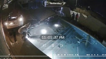 Video shows car crashing through wall and flipping over backyard pool as driver lands in water