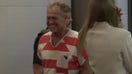 Barry Morphew smiles as he enters court