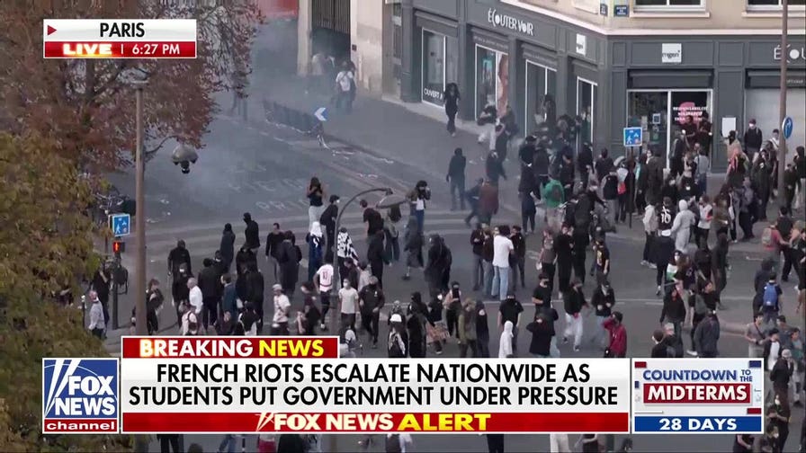 French government faces rising pressure as riots spread