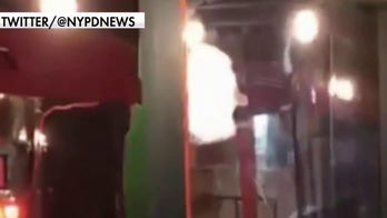  Activists in Manhattan break windows at restaurant