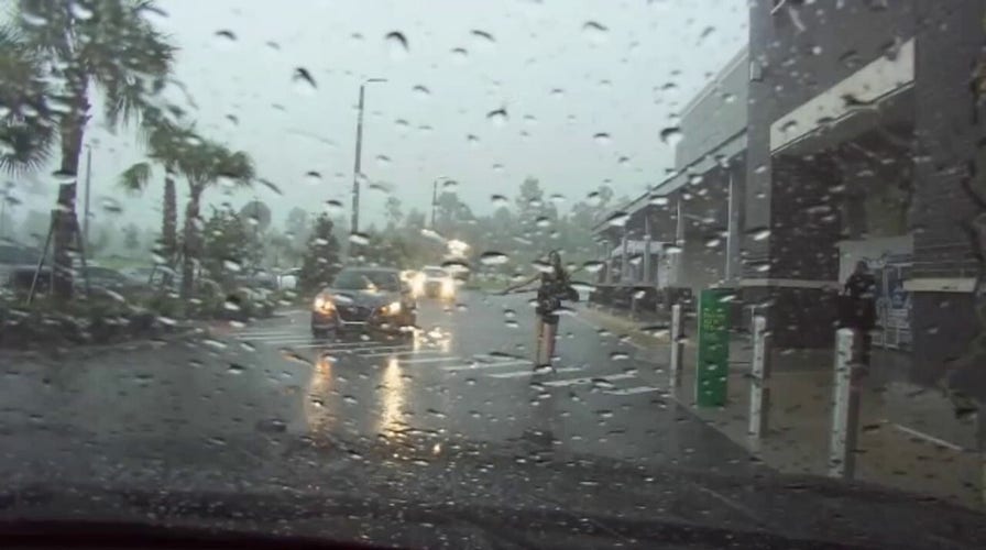 Florida woman caught on video holding pitchfork, whip outside grocery store before being arrested