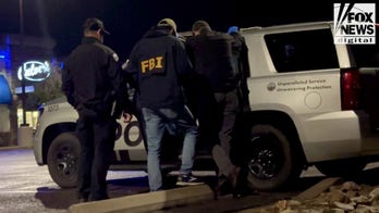 A man is detained near Nancy Guthrie’s house