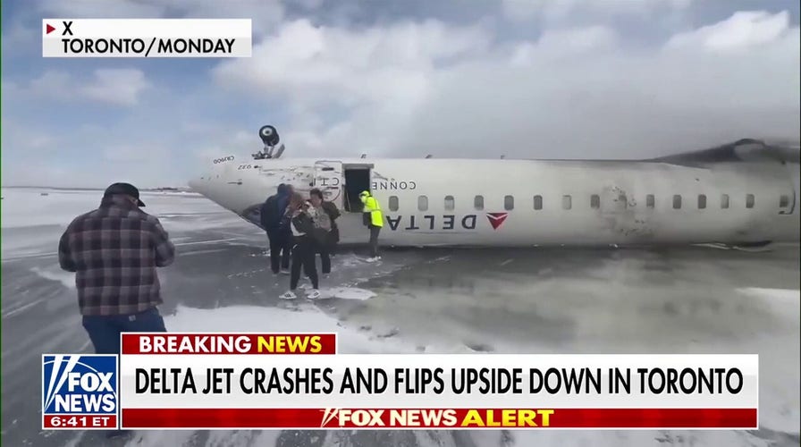 Former FAA administrator is 'not concerned at all' about air travel safety after the Trump administration fires hundreds of FAA workers