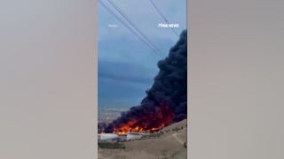 Massive fire RAGES at Tehran oil depot after Israeli strikes
