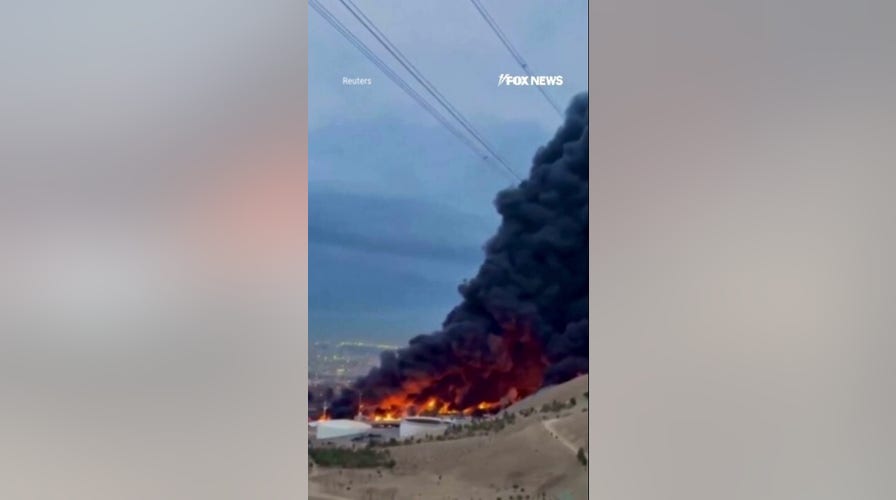 Massive fire RAGES at Tehran oil depot after Israeli strikes