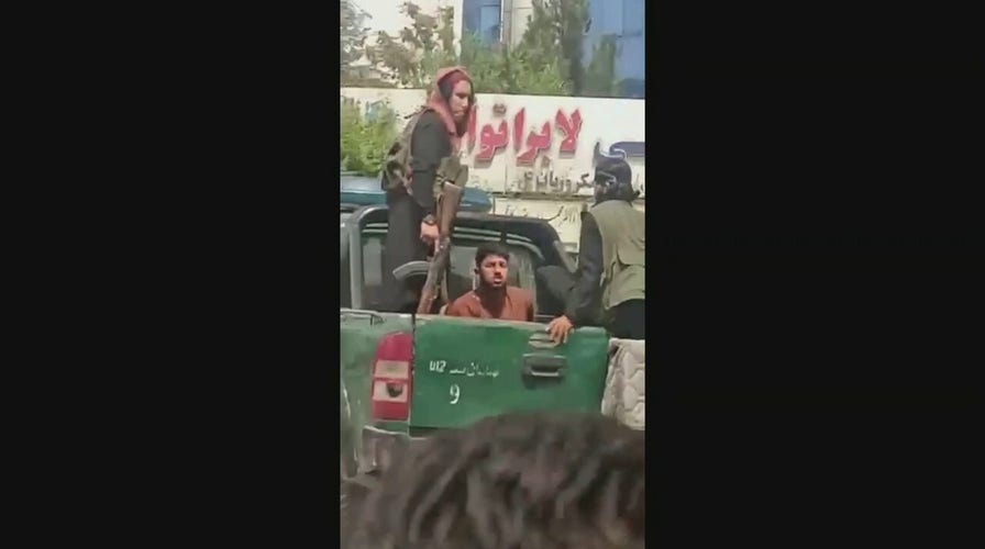 Scenes from Afghanistan: Taliban fighters seen beating man, crowds gather at airport