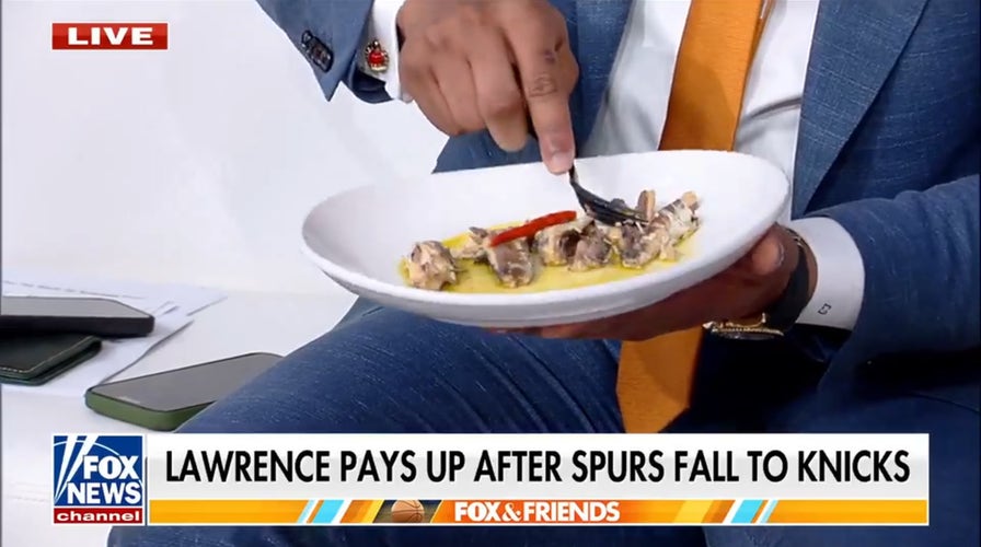 Lawrence Jones eats sardines after Spurs lose NBA Finals bet