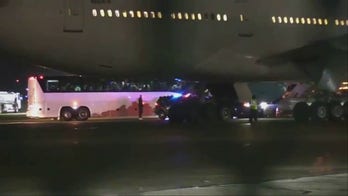 Migrants flown into Illinois from Texas in darkness