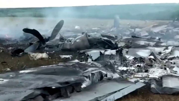 Debris of a downed Russian IL-22M military plane