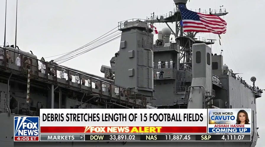 China spy flight debris on its way to FBI lab