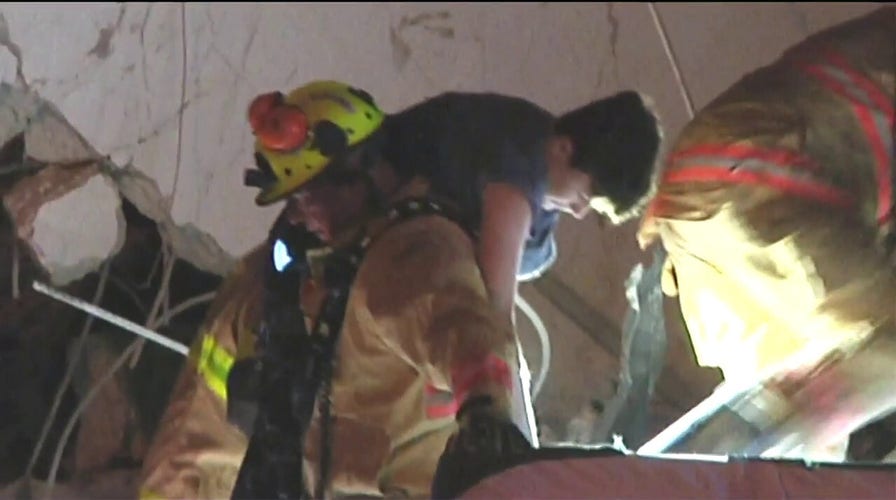 Child pulled from rubble of Florida apartment collapse
