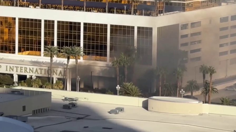 Trump Tower in Las Vegas is evacuated as smoke billows from valet entrance