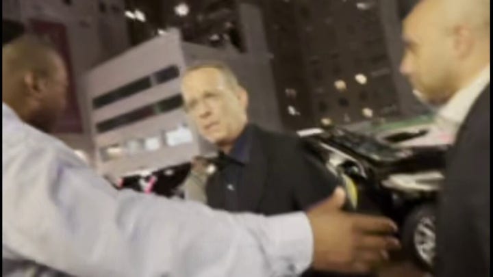 Tom Hanks yells at fan after wife Rita Wilson gets pushed