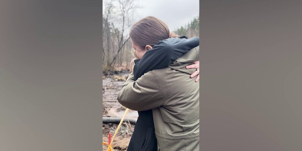 Lithuanian defense minister hugs US ambassador at search site