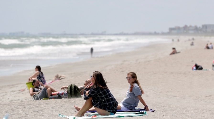 Florida residents flock to Cocoa Beach as restrictions are lifted