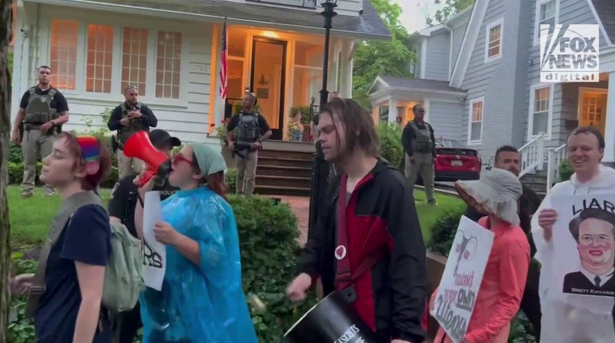 Protestors and Drummers march outside of Supreme Court Justice Kavanaugh's house