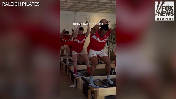 Men's rugby team tries Pilates, finds workout is more challenging than it seems