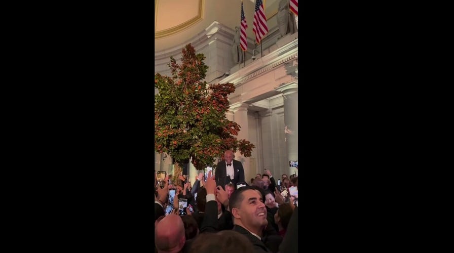 Jake Paul puts Mike Tyson on his shoulders at inaugural ball