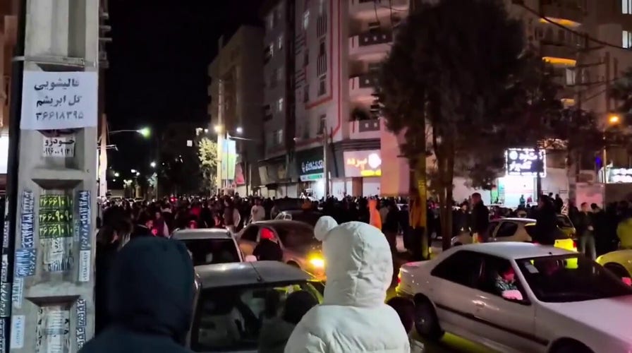 Iranians celebrate in the street after the death of the ayatollah in Israeli strike