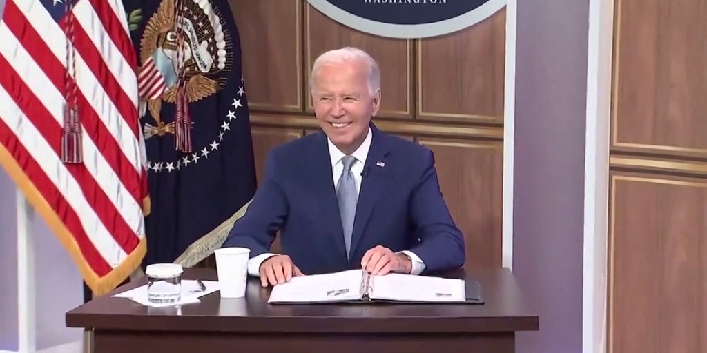 Biden grins after 'Investing in America' speech and ignores press shouting questions