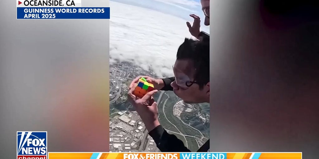 Man breaks world record after solving 2 Rubik's Cubes while skydiving