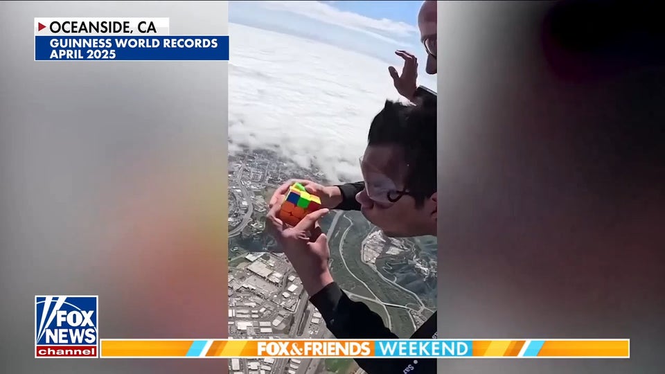 Man breaks world record after solving 2 Rubik's Cubes while skydiving