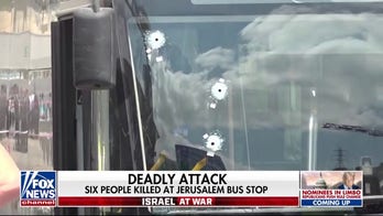 At least 6 dead, 12 injured in Jerusalem bus stop shooting