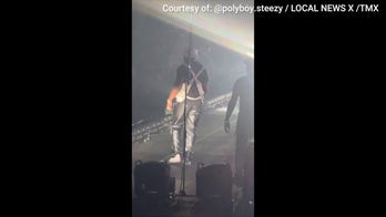 50 Cent throws two microphones into crowd, allegedly causing injury