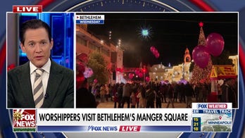 Pilgrims visit the place of Jesus' birth