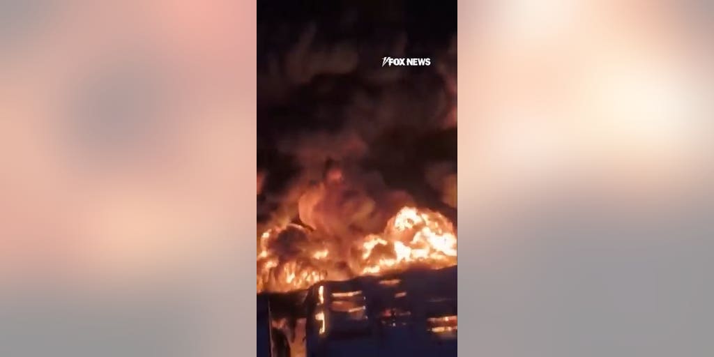 Russian warehouse ENGULFED IN FLAMES after Ukrainian drone attack