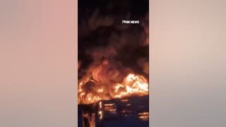 Russian warehouse ENGULFED IN FLAMES after Ukrainian drone attack