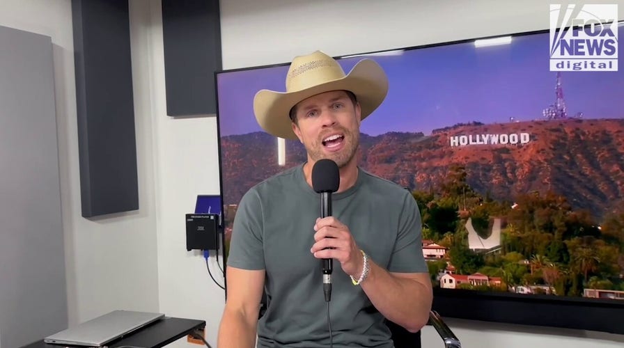 Dustin Lynch says he's feeling pressure from his friend group to 'settle down'
