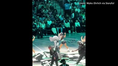 Hillary Clinton takes in New York Liberty mascot's dance performance