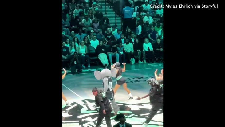 Hillary Clinton takes in New York Liberty mascot's dance performance