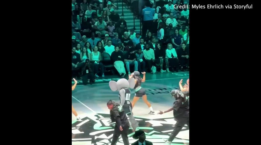 Hillary Clinton takes in New York Liberty mascot's dance performance