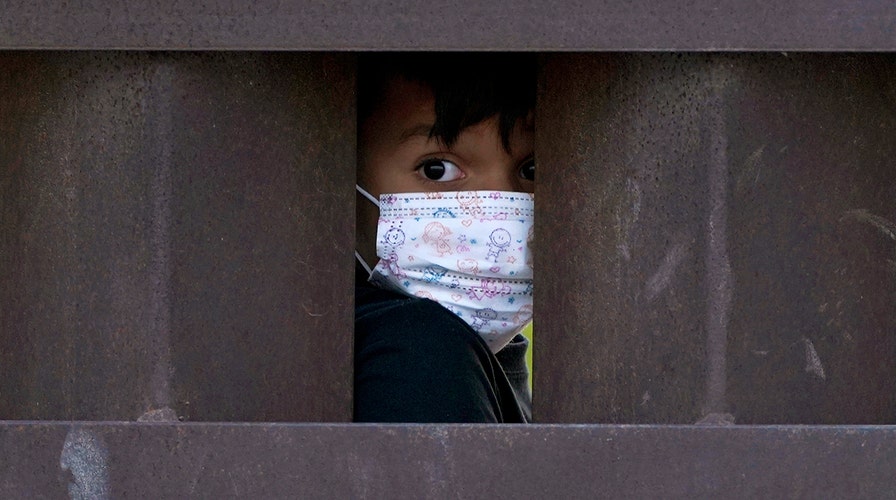 Unaccompanied migrant children in US custody tops record high 20,000