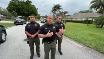 Florida police say suspect was 'actively stabbing' woman in upscale residential neighborhood
