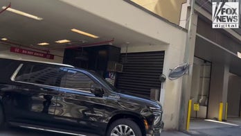 John Bolton departs D.C. office as FBI agents load boxes in documents probe